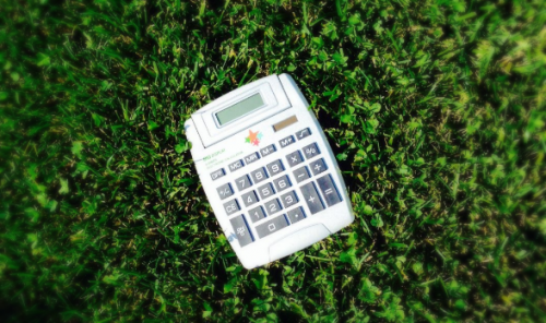greenCalculator calculator in the grass
